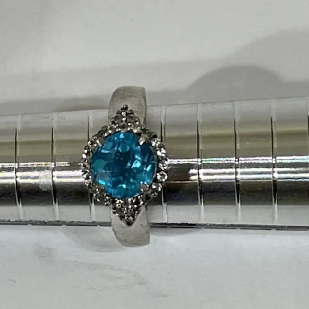 Sterling silver and London blue topaz and moisonnite cocktail ring.